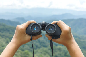Binoculars looking at mountains